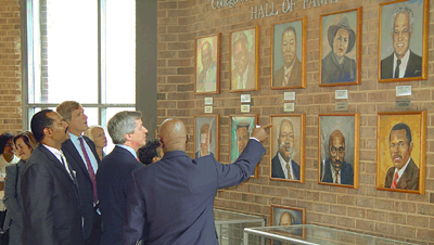 Ernest visiting Chicago State University's Wall of Fame with Jamie Dimon and

Jeremy Farmer.